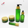 green custom cream glass jar glass pump spray lotion oil toner bottle with bamboo cap BJ-245B